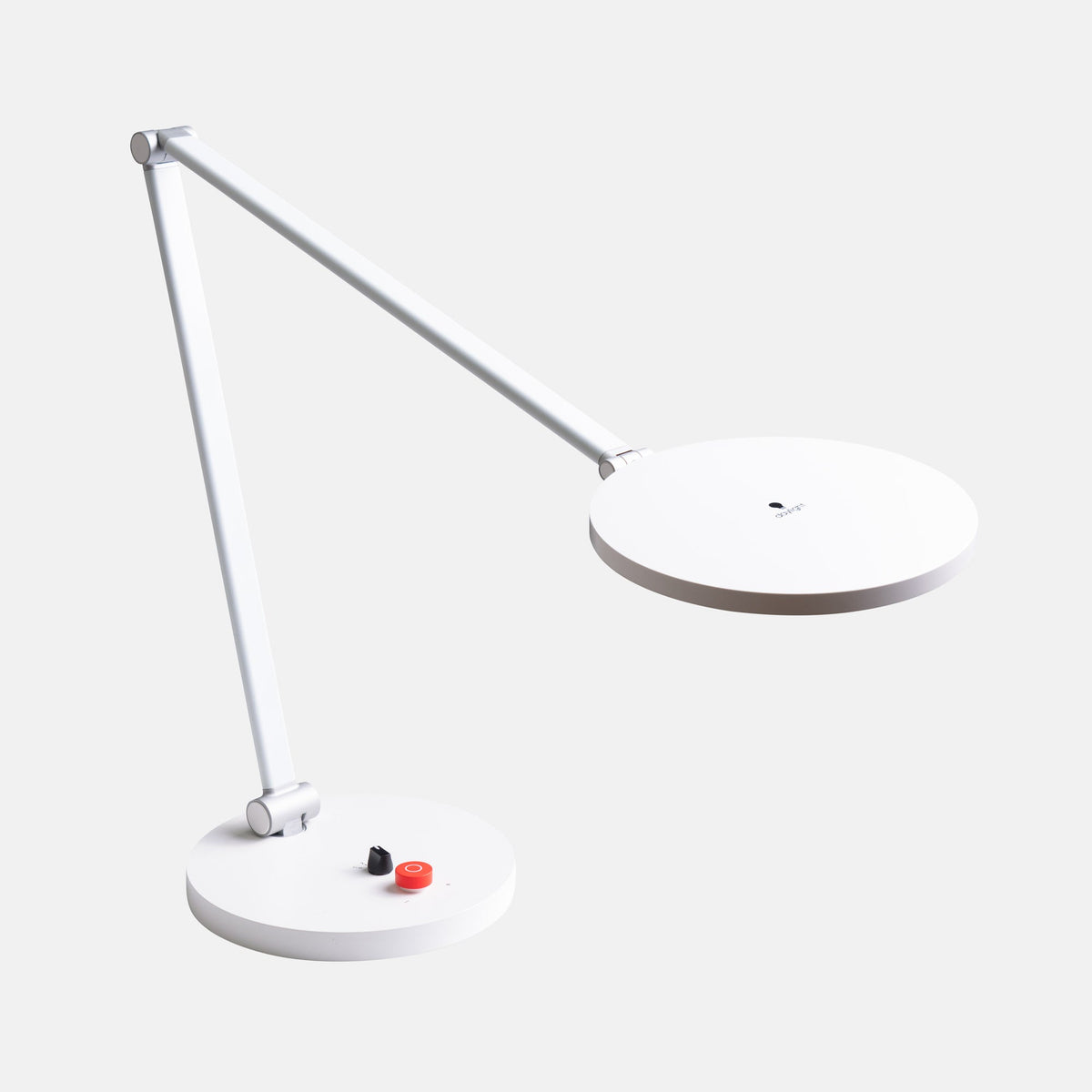 White LED desk lamp on a light gray background