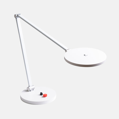 White LED desk lamp on a light gray background