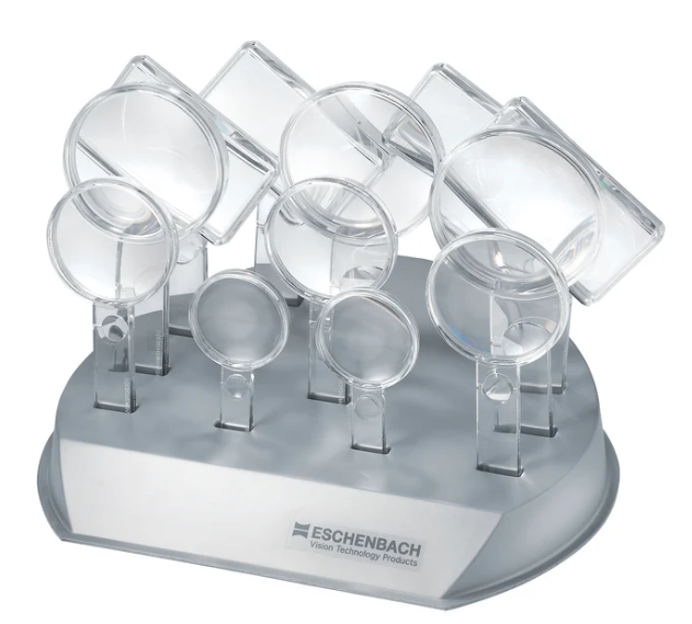 Group of clear handheld magnifying glasses in a display stand