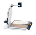 A desktop document scanner with a white base, black adjustable arm, and a dark gray scanning bed holding a sheet of paper, shown on a plain white background.