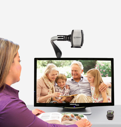Woman using a Acrobat 27 HD Ultra to read a book